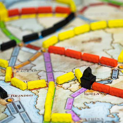 Ticket to Ride game board with different color trains