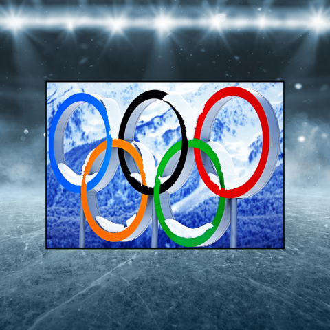 A photograph of the olympic rings in a snowy mountain area superimposed on an out of focus shot of an indoor ice rink
